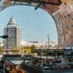 Markthal in Rotterdam with restaurants inside Foodhallen. Photo by Mike van den Bos, Unsplash