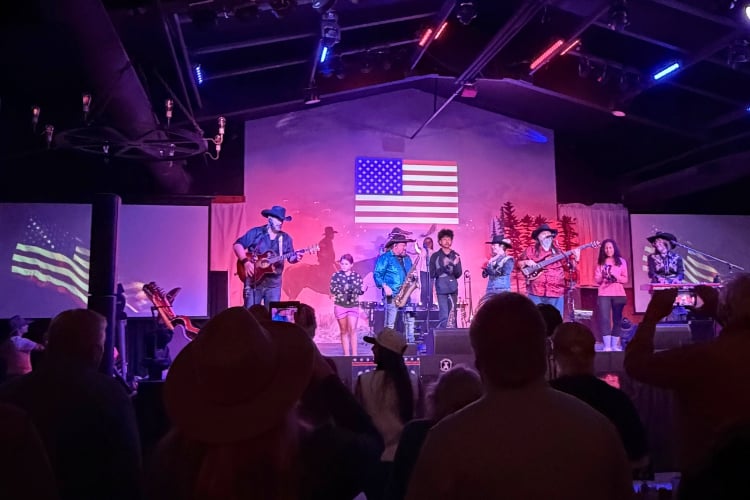 Ryan Martin and the Triple C Cowboys perform a range of Americana classics at Cody Cattle Company's dinner show. Photo by Isabella Miller