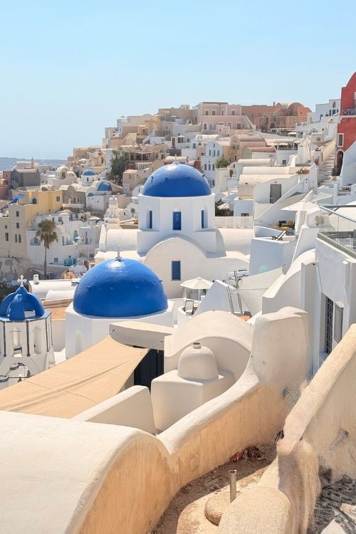 Oia's famous white buildings and blue-topped churches