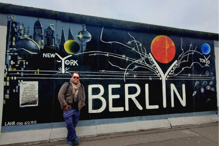 The author at the East Side Gallery, Berlin. Photo by C. Ludgate