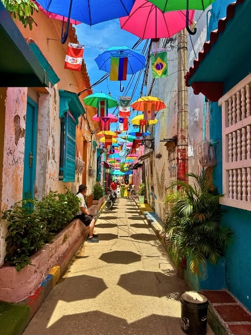 Wandering the umbrella-lined streets of Cartagena, Colombia, the place that finally pushed me to get serious about learning Spanish. Photo by Isabella Miller