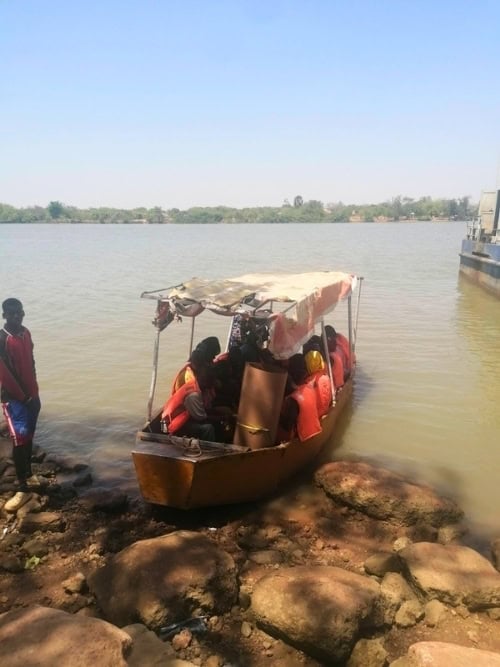 Water taxi or passenger ferry at Janjanbureh, Gambia. Photo by Troy Nahumko