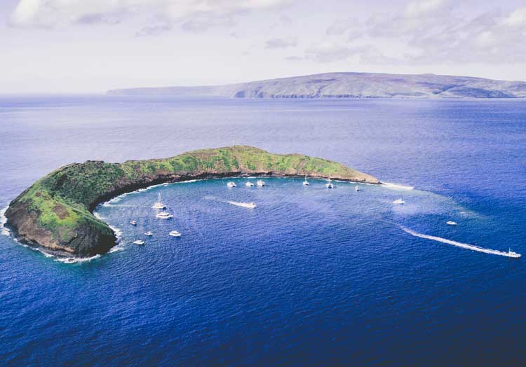 Aerial view of Molokini Crater in Maui. Photo by Farid Askerov on Unsplash
