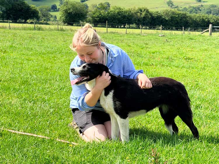 Erin and her sheepdog, Annie, at  Pandy Farm Experience in Wales. Photo by Janna Graber
