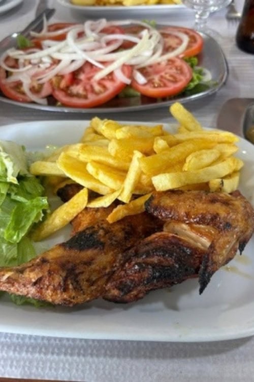 The holy grail of Frango Assado. The best chicken ever at Luis dos Frangos, Sao Bras de Alportel, Portugal. Photo by Hayley Clark