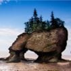 Famous archway at Hopewell Rocks. Image by by mirceax from Getty Images via Canva