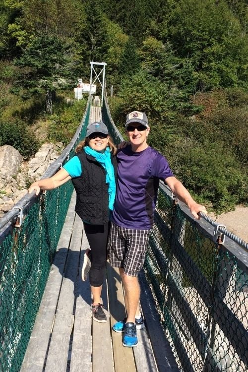 Bay of Fundy suspension bridge stretches across Big Salmon River and provides access toward the famed Fundy Footpath