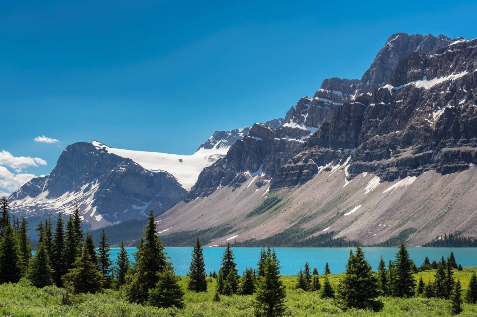 Take a trip through the magnificent Canadian Rockies. Image by lucky-photographer from Getty Images Pro via Canva