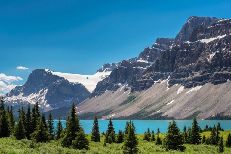 Take a trip through the magnificent Canadian Rockies. Image by lucky-photographer from Getty Images Pro via Canva