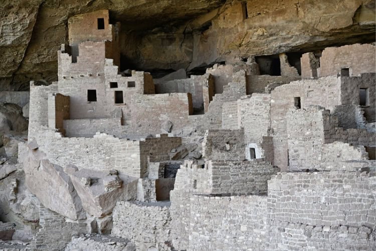 Ancient cliff dwellings with most of their masonry still standing. Photo by Tab Hauser