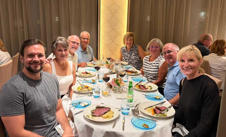 Enjoying the comradery of new friends onboard. Photo courtesy Janna Graber