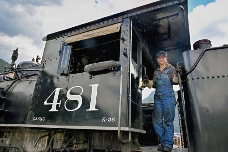 Engineer Liz in charge of driving locomotive 481 back to Durango. Photo by Tab Hauser