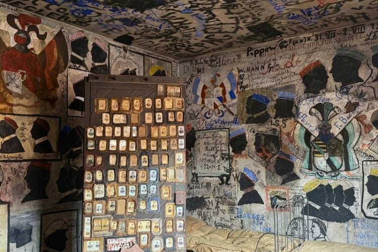 Graffiti decorates the walls of the Student Jail. Photo by Debbie Stone