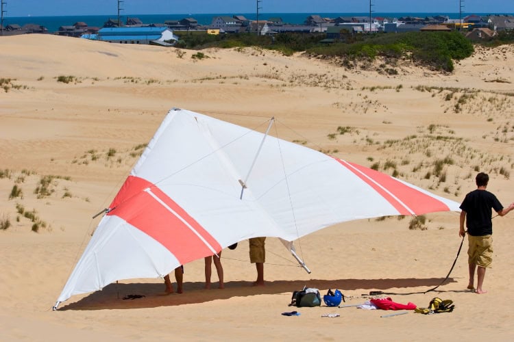 Hang gliding in the Outer Banks. Photo by JillLang from Getty Images via Canva