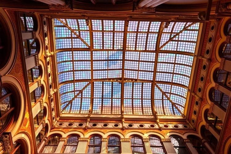 The Hilton Garden Inn Milwaukee Downtown features a magnificent five-story central atrium crowned by a soaring historic glass skylight. Photo courtesy of Frank Hosek