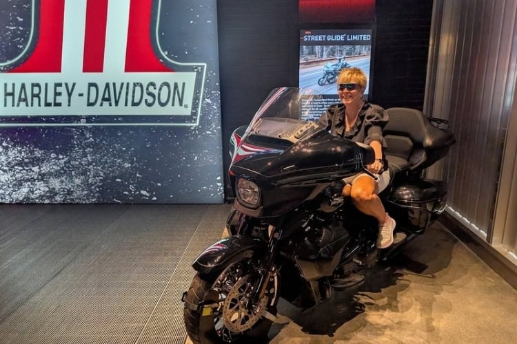 Kathy Hosek on a motorcycle at the Harley Davidson Museum. Photo courtesy of Frank Hosek