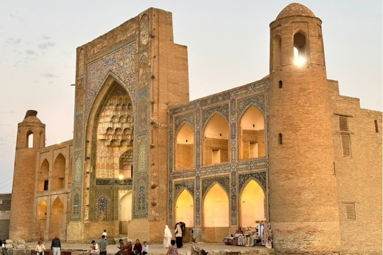 The Kukaldosh Madrasa at dusk. Photo by Steve Sindiong