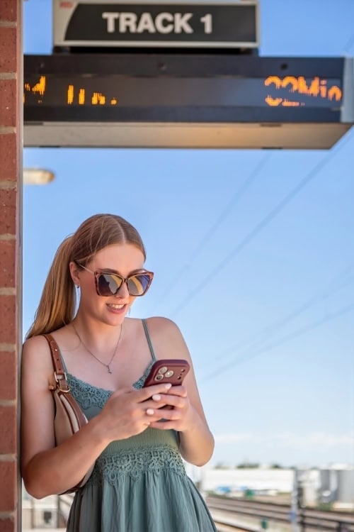 Learning Spanish anywhere, even while waiting for a train. Photo by Teri K. Miller