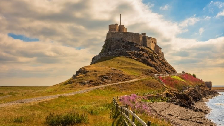 Lindisfarne Castle on Holy Island, Northumberland. Photo by Pixabay contributor