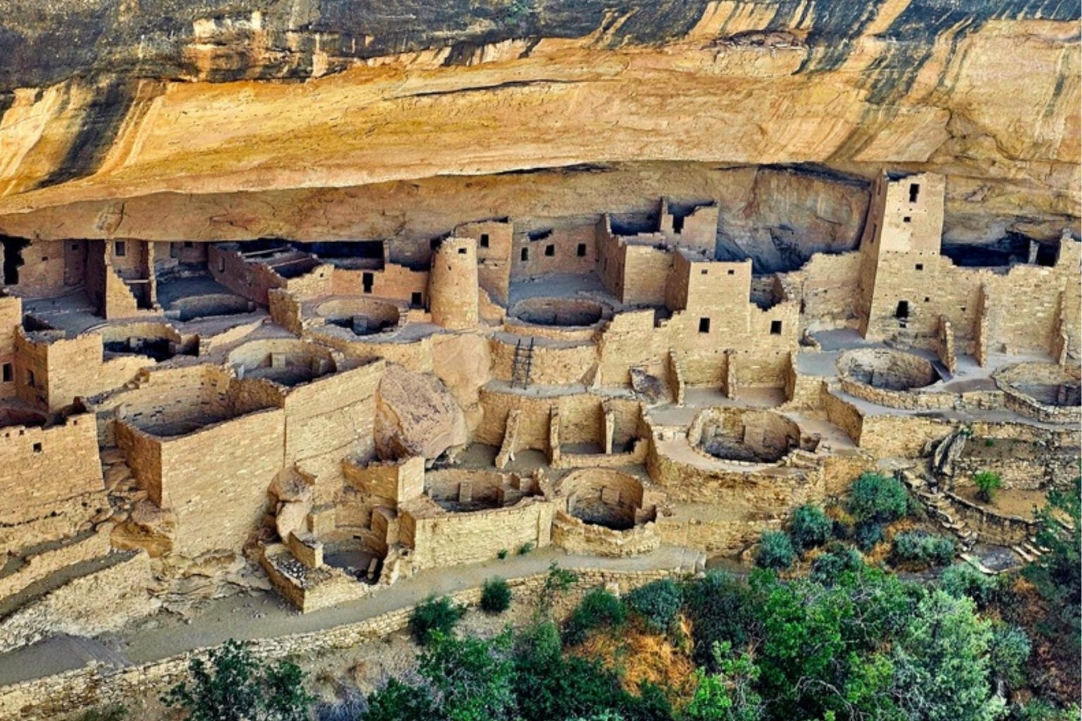 Viewing the rooms and kivas of Cliff House. Photo by Tab Hauser