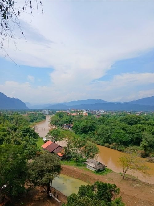 The Nam Song River winds through the lush countryside of Vang Vieng, Laos. Photo by Shivika Singh