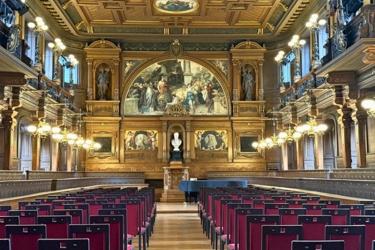 The gold-colored nave of an old church in Heidelberg. Photo by Debbie Stone