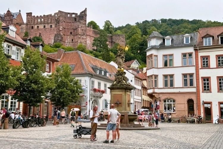 Old Town ambiance with a fountain and castle view. Photo by Debbie Stone