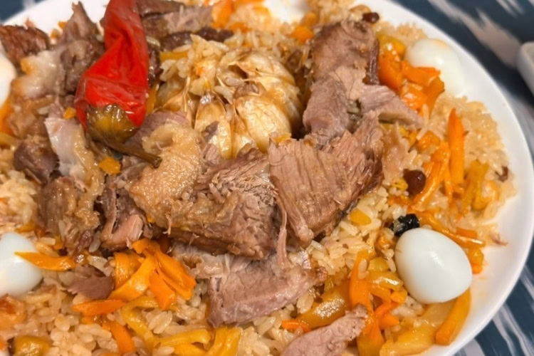 A plate of Plov, the national dish of Uzbekistan. Photo by Steve Sindiong