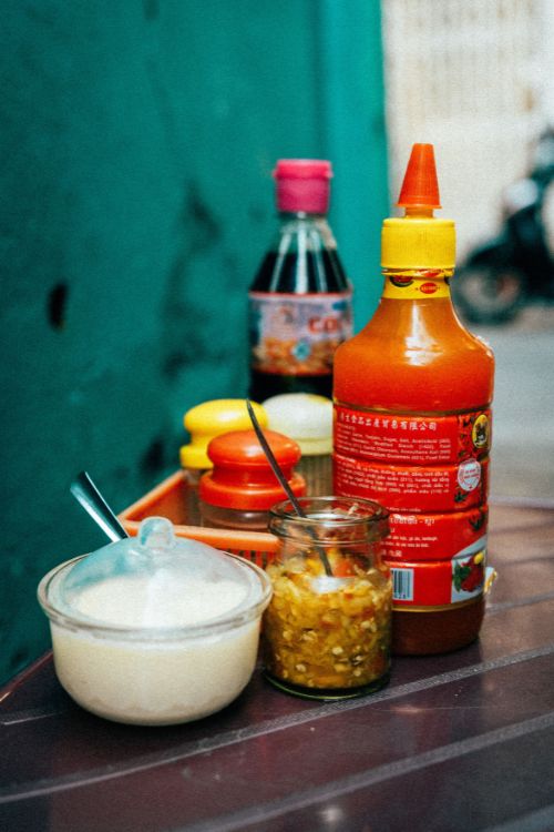 An array of condiments to spice up your soup