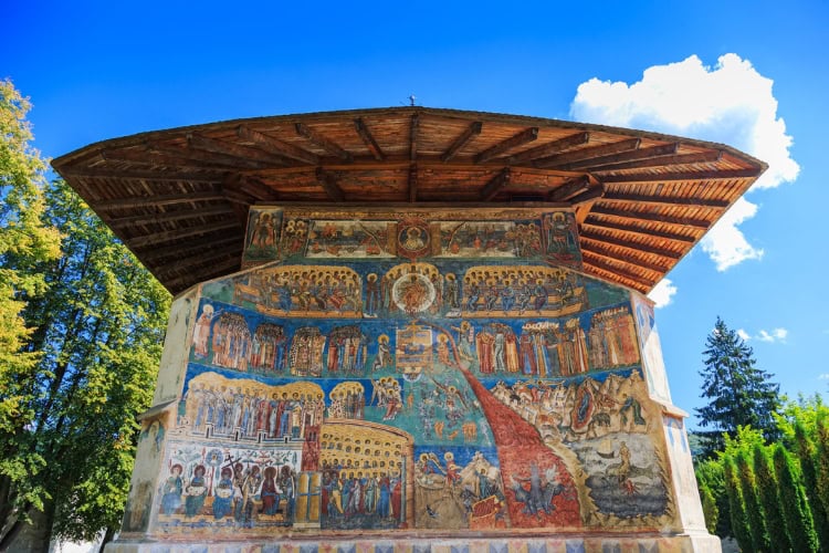 A quick glimps of the unique hue of blue found at the Voronet Orthodox monastery. Photo by SCStock via iStock