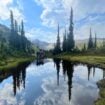 Alpine lakes mirror the Selkirk Mountains. Photo by guide, Tate