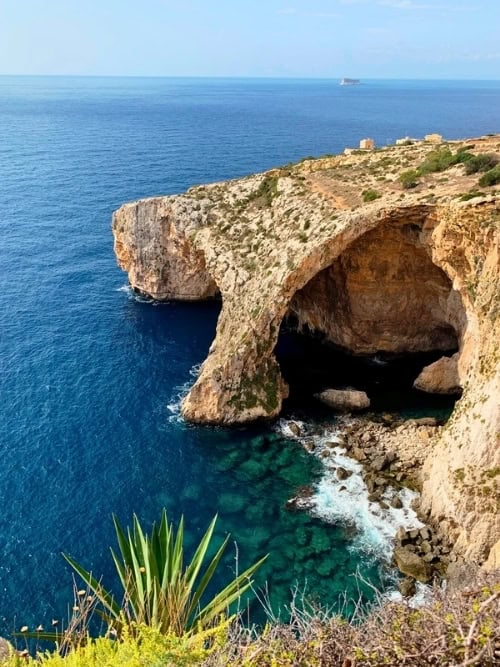 Cliff-top viewpoint overlooking the Blue Grotto on Malta's southern coast. Photo by Brent Cassie