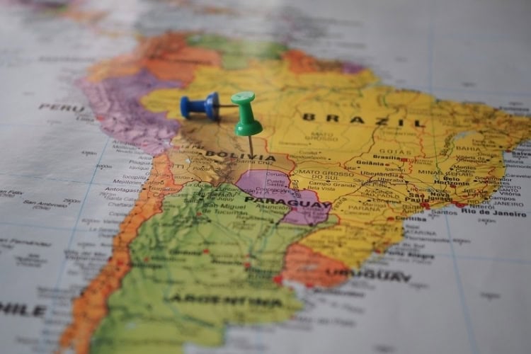 Map of South America with pins marking locations in Brazil and Bolivia. Photo by Beate Vogl, Pexels