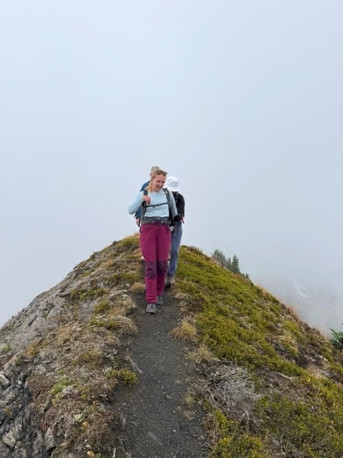 Tate leading the group along a narrow mountain ridge. Photo by Brent Cassie