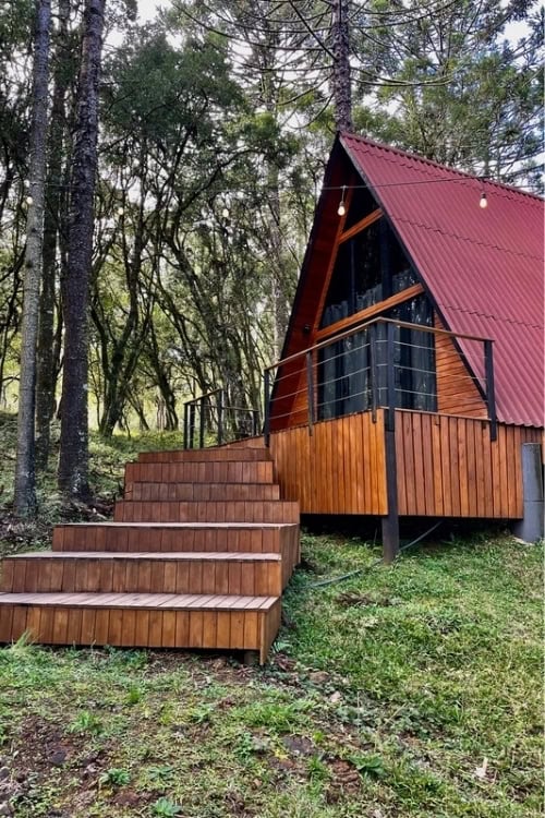 Our A-frame cabin in the woods. Photo by Ellen Carter