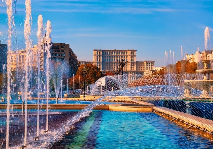 The Parliament Palace in Bucharest. Photo by Cristian Mircea Balate from Getty Images via Canva