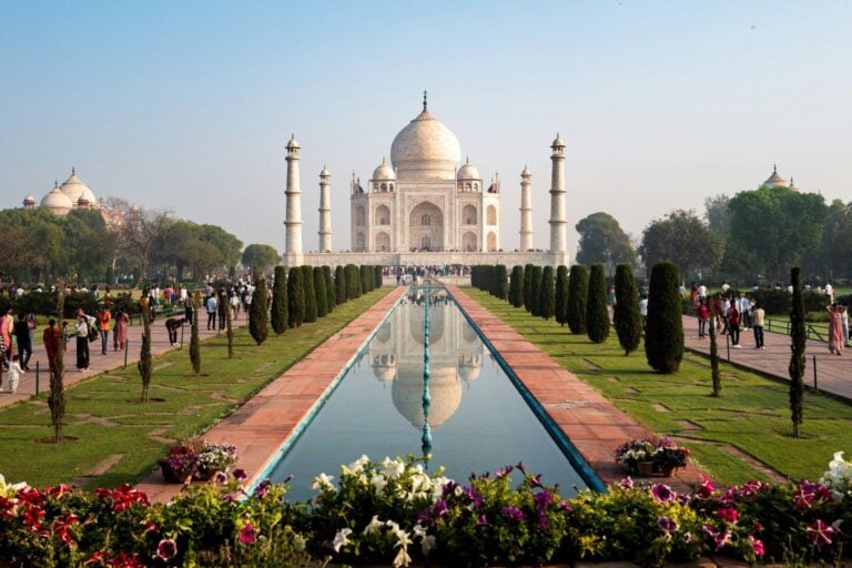 The Taj Mahal in Agra, India, reflected in a long pool. Photo by Letian Zhang, Unsplash
