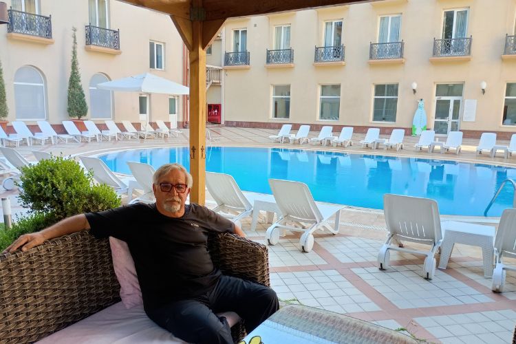 Author's husband, Ernie, relaxing at 5-star Lotte City Palace Hotel